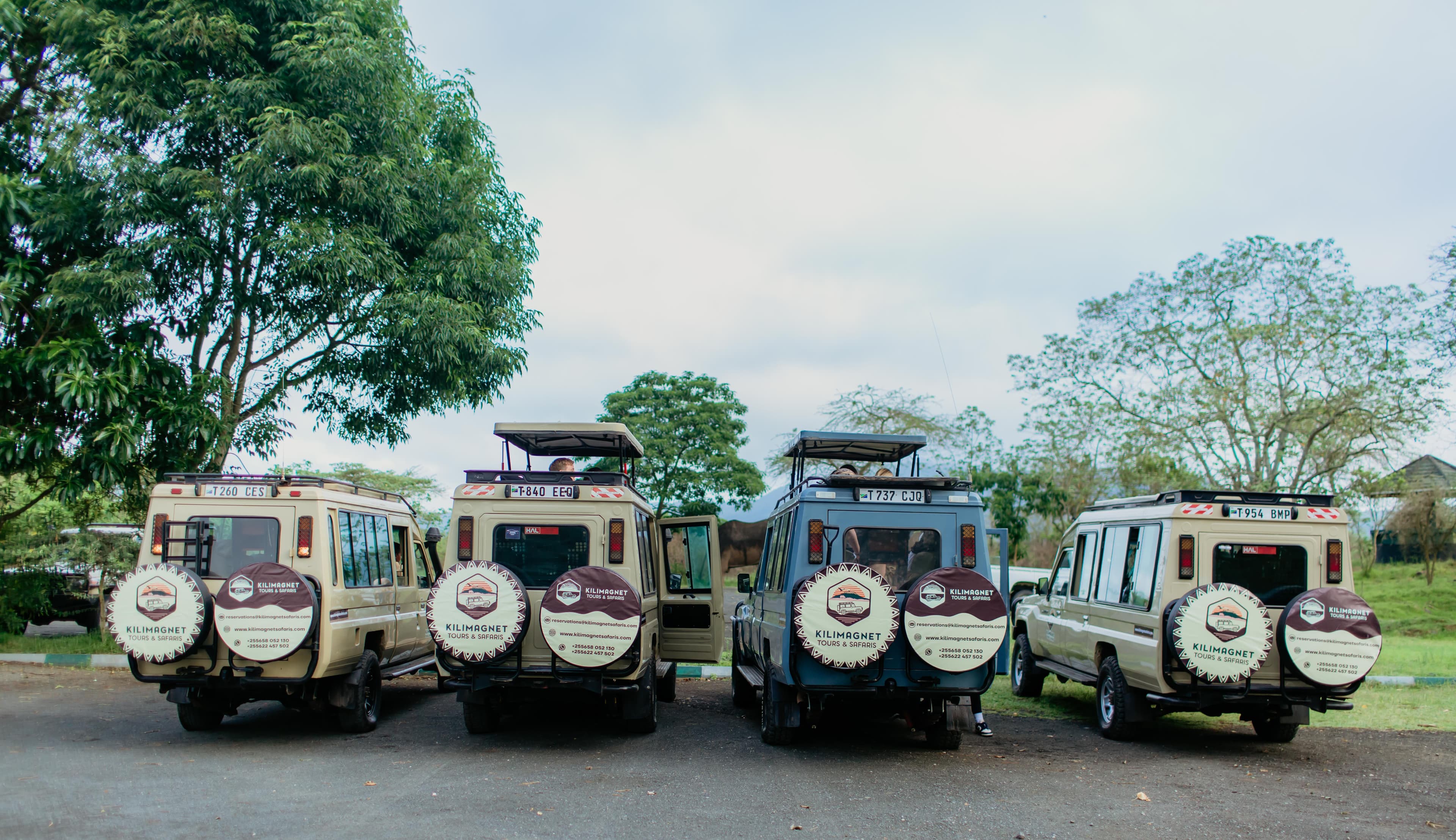 Kilimagnet team with safari vehicles